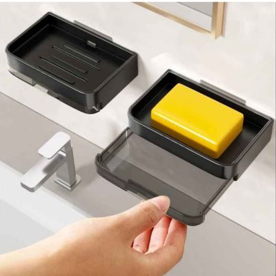 porte savon douche deux noirs main retire bac eau