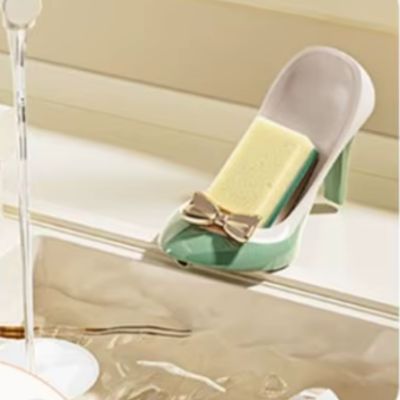 porte savon pour baignoire vert proche robinet