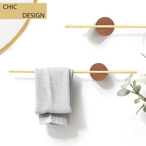 porte serviette mural salle de bain deux barre doree base marron serviette grise