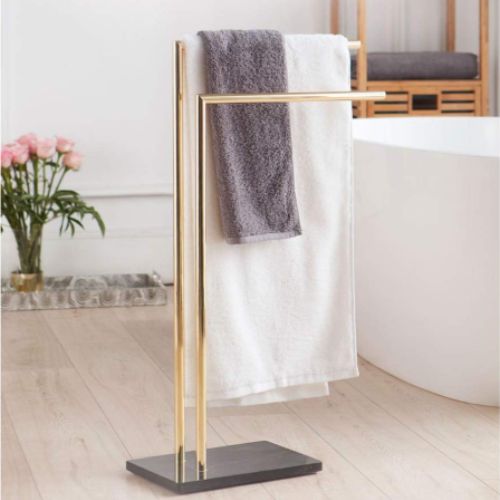 porte serviette sur pied dore deux serviettes