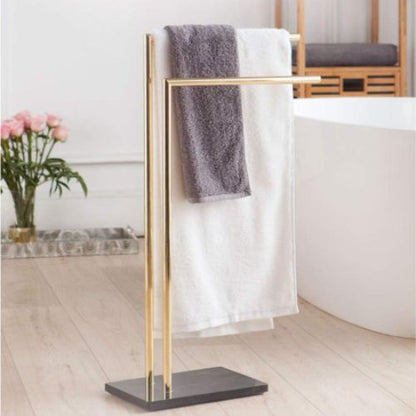 porte serviette sur pied dore deux serviettes