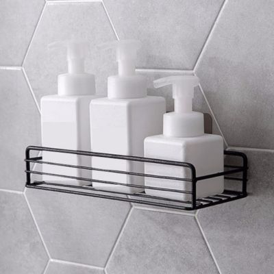 rangement dans la douche noir trois flacons variante
